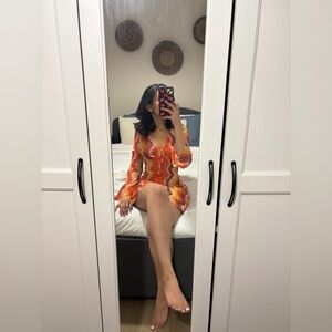 Mesh V neck abstract wave knotted mini dress